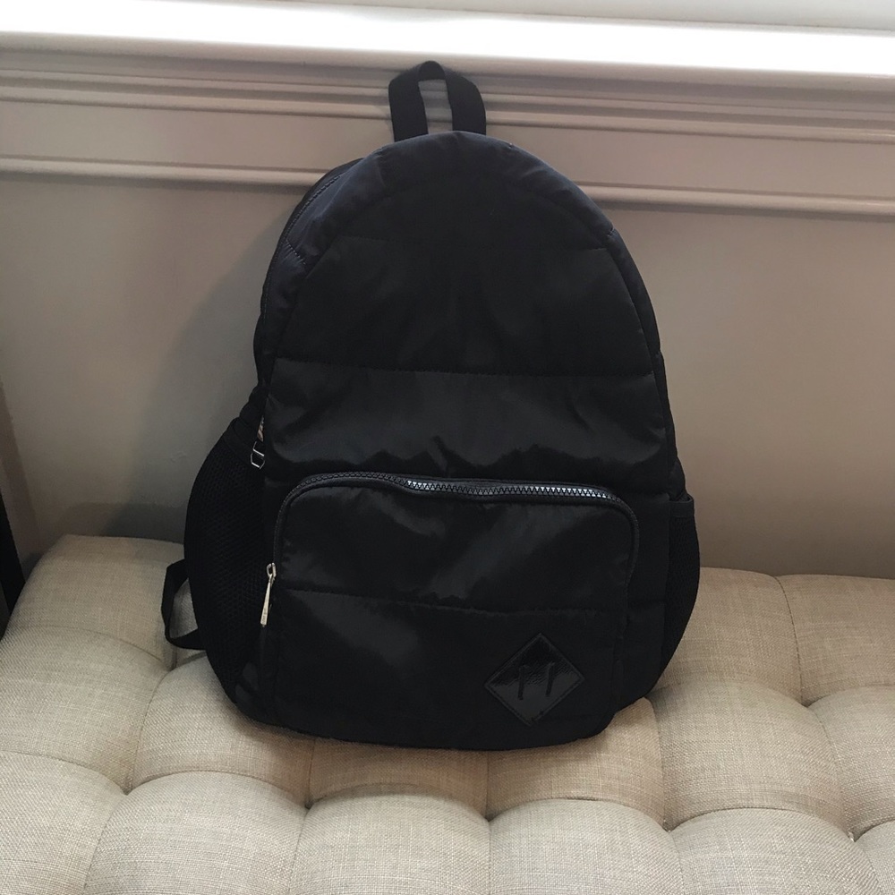Sleek black backpack for work and commuting